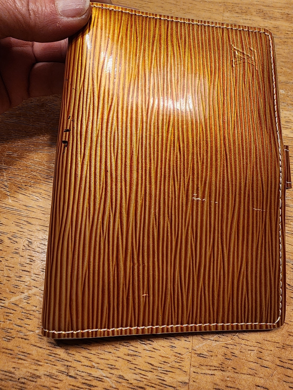 vintage Louis Vuitton Cyber Epi agenda PM cover in orange featuring the signatur